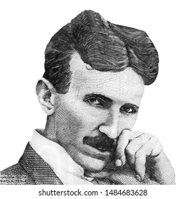 World Famous Inventor Nikola Tesla Black And White Portrait Close Up Isolated On White Background. Fragment Of Serbian Banknote