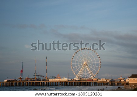 The world famous Steel pier amusement park can be seen in the early morning hours on the Jersey shore of Atlantic city. 