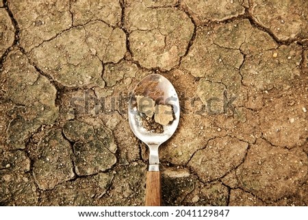 World Food Problem Concept. Environmental Impact. Food Shortage ,Global Issues in Agricultural Food Production. Cracked Soil, Desertification, Water, Pollution, Energy,Climate Change and Food Security