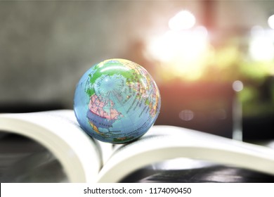 World globe on text book.    
International education school Concept. Distance learning online education. 
Stay home safe lives of Coronavirus or covid disease stop outbreak. 2019 nCov.