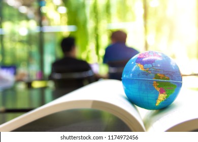 World Globe On Text Book.    
International Education School Concept. 