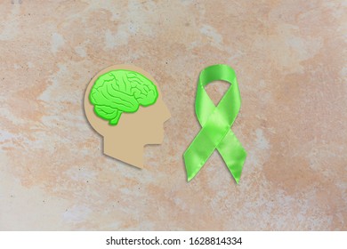 World health day concept. Awareness ribbon and brain symbol - Shutterstock ID 1628814334