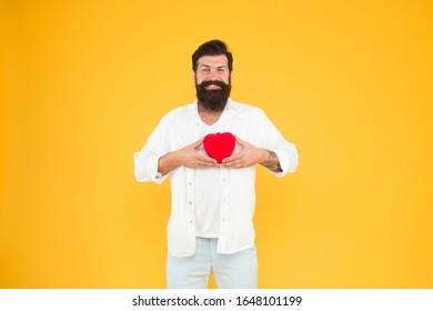 World Heart Day. Brutal Hipster Yellow Background. Happy Valentines Day. Heart Poblems And Disease. Having Healthy Habits In Lifestyle. Preventing Heart Attack. Fall In Love. Bearded Man Red Heart.