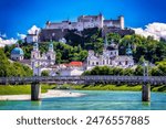 World heritage of the old town of Salzburg in Austria with medieval Hohensalzburg fortress and Salzach river