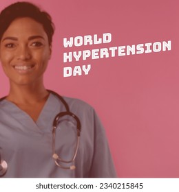 World hypertension day text by confident african american female doctor over pink background. digital composite, awareness day, hypertension prevention, healthcare, medical professional, copy space. - Powered by Shutterstock