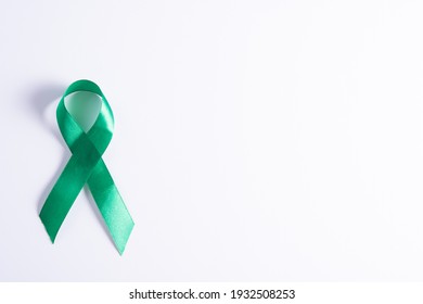 World Kidney Day, Green Ribbon Awareness Of Kidney Disease Isolated White Background.