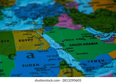 World map closeup with sharp focus on saudi arabia. Wonderlust or tour or travel concept.