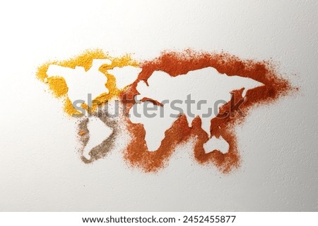 World map of different spices on white textured table, flat lay