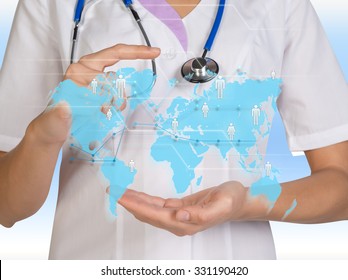 World map. The doctor presses a computer interface. - Shutterstock ID 331190420