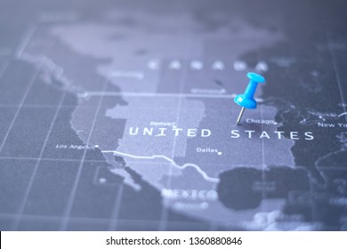 World Map Focus United States, Blur Map And Selective Focus On Blue Pin. The Economic Focus Of USA. World Economic. United States.