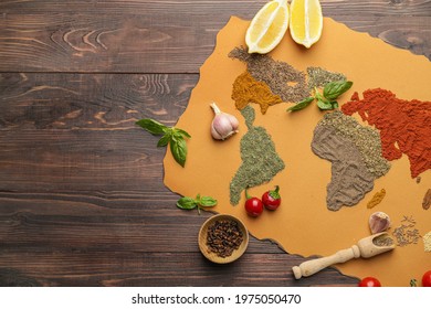 World map made of different spices on wooden background - Shutterstock ID 1975050470