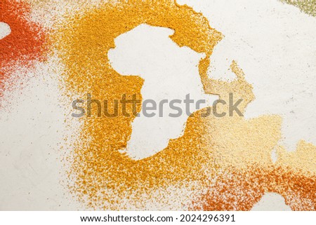 World map made of different spices on light background