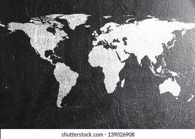 world map on chalk board. Earth silhouette is from visibleearth.nasa.gov