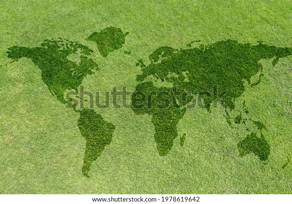 Map on green grass lawn background for global eco-friendly environment, ecological and environmental saving, earth day, and go green backdrop concept .