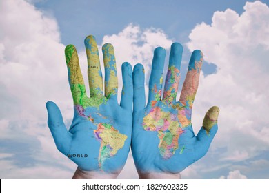 World map on the hand