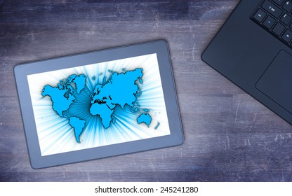 World Map On A Tablet, Concept Of Globalisation, Cold Blue Filter