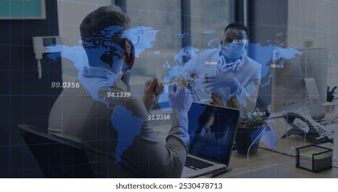 World map over two diverse male office colleagues wearing face masks discussing at office. Business data and analytics concept - Powered by Shutterstock