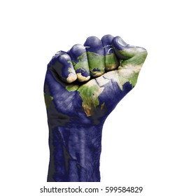 World map painted onto a male clenched fist. Strength, Power, Protest concept