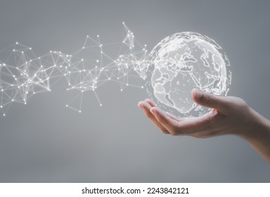 World map point and linear concept of global business Digital Link Technology. Businessman holding global network connection big data analytics and business concept. - Powered by Shutterstock