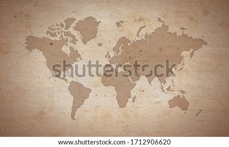 world map silhouete on old paper surface