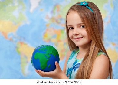 The World In My Hands - Little Girl In Geography Class Holding Earth Globe, Copy Space