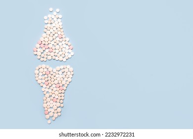 World osteoporosis day. Human  joints and bone made of pills on blue background - Powered by Shutterstock