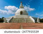 The World Peace Pagoda, also known as the Nipponzan Peace Pagoda, is a magnificent Buddhist monument in Lumbini, Nepal, a UNESCO world heritage site. It was designed and built by Japanese Buddhists. 