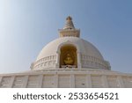 World Peace Pagoda in Lumbini, Nepal under a bright blue clear sky