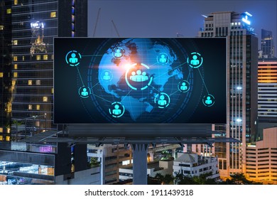 World planet Earth map hologram and social media icons on billboard over night panoramic city view of Bangkok, Southeast Asia. Networking and establishing new connections between people. Globe