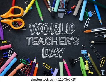 World Teacher's Day Text. School Stationary Top View on Blackboard