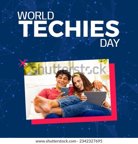 World techies day text with happy diverse couple at home using tablet and smartphone, on blue. Global celebration campaign promoting importance of technology in society, digitally generated image.