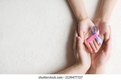 World Thyroid Day. Adult And Child Holding Thyroid Cancer Awareness Ribbon In Teal Pink Blue. Problems With Thyroid. Polycystic Disease. World Cancer Day.