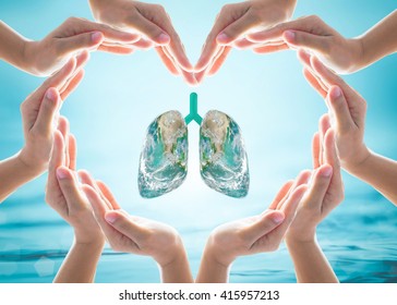 World Tuberculosis Day And No Tobacco Day Campaign, Healthy Lung In Heart-shaped Hand Protection Health Care Design Logo Concept. Element Of This Image Furnished By NASA