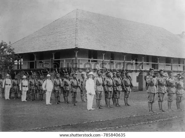 World War 1. German officers in drill formation\
with colonial troops at the German Government Station, Ebolowa,\
Cameroon, West Africa. Ca.\
1915.