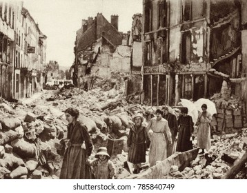 World War 1. Women and children who had been hiding in the cellars of Chateau-Thierry, France, emerging after the Allies liberated the city in July 1918.