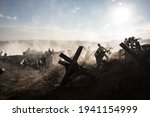 World War 2 reenactment (D-day). Creative decoration with toy soldiers, landing crafts and hedgehogs. Battle scene of Normandy landing on June 6, 1944. Selective focus