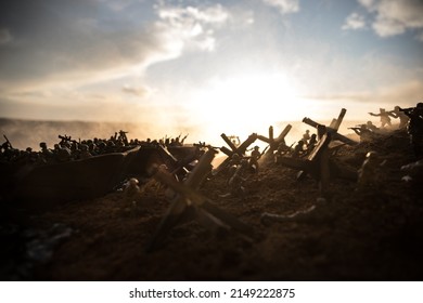 World War 2 reenactment (D-day). Creative decoration with toy soldiers, landing crafts and hedgehogs. Battle scene of Normandy landing on June 6, 1944. Selective focus