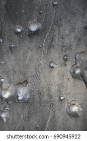 World War II Bullet Holes In A Cemetery-wall.