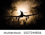 World war ii fighter plane at sunset or dark orange fire explosion sky. War scene. German figher at sky. Selective focus