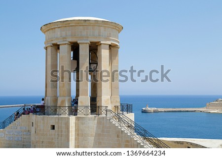 World War II Siege Bell War Memorial seen from the the Lower Barrakka Gardens, Valletta, Malta