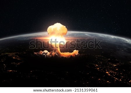 World War III. Atomic explosion on planet earth, view from space. Air strike missiles. Bomb blast. Hydrogen bomb. Nuclear mushroom