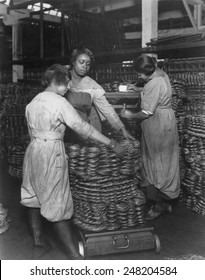 World War One. On The American Home Front, African American Women Weigh Wire Coils And Recording Weights. April 16, 1919.