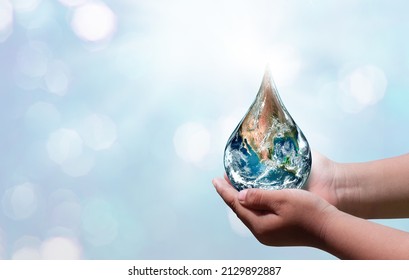 World Water Day. A Globe In The Shape Of A Drop Of Water Falling Onto The Boy's Hand On Blue Sea Background. Elements Of This Image Furnished By NASA 
