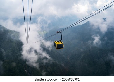 The world's longest electric cable car to Fan Si Pan mountain peak the highest mountain of Indochina with mist over the mountains - Powered by Shutterstock