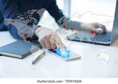 Worlds maps on virtual screen. Business, internet and technology concept.