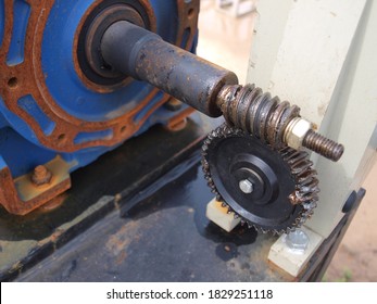 Worm gear or worm drive tramsission. From the electric motor driving the outdoor floodgates gear system. Focus close and choose the subject.