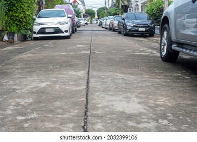 Worm's Eye View Of Concrete Road In Village.