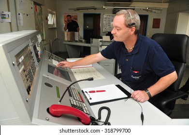 Worms, Germany - Jule 21, 2009 - Fire Fighter In Control Room Of Fire Department Worms Taking An Emergency Call


