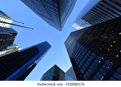 Worm's-eye view architecture and blue background , Lower Manhattan, New York City, USA - Powered by Shutterstock