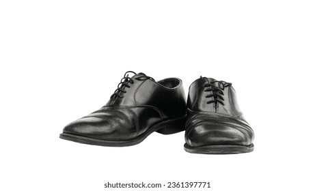 Worn black leather shoes for men isolated on white background. Clipping Path - Powered by Shutterstock